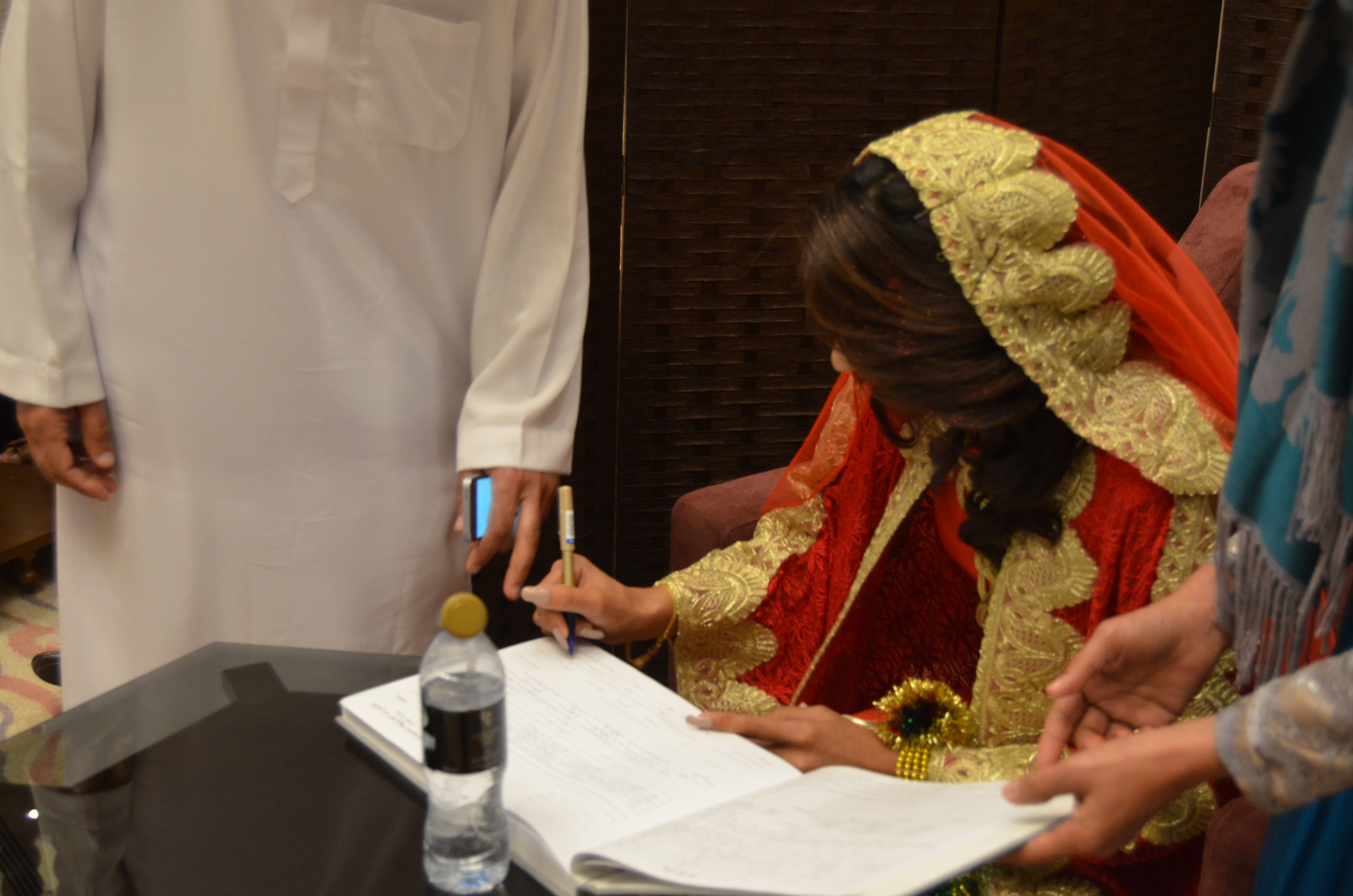 Signing the Nikkah papers